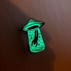 Glow in the dark abduction pin